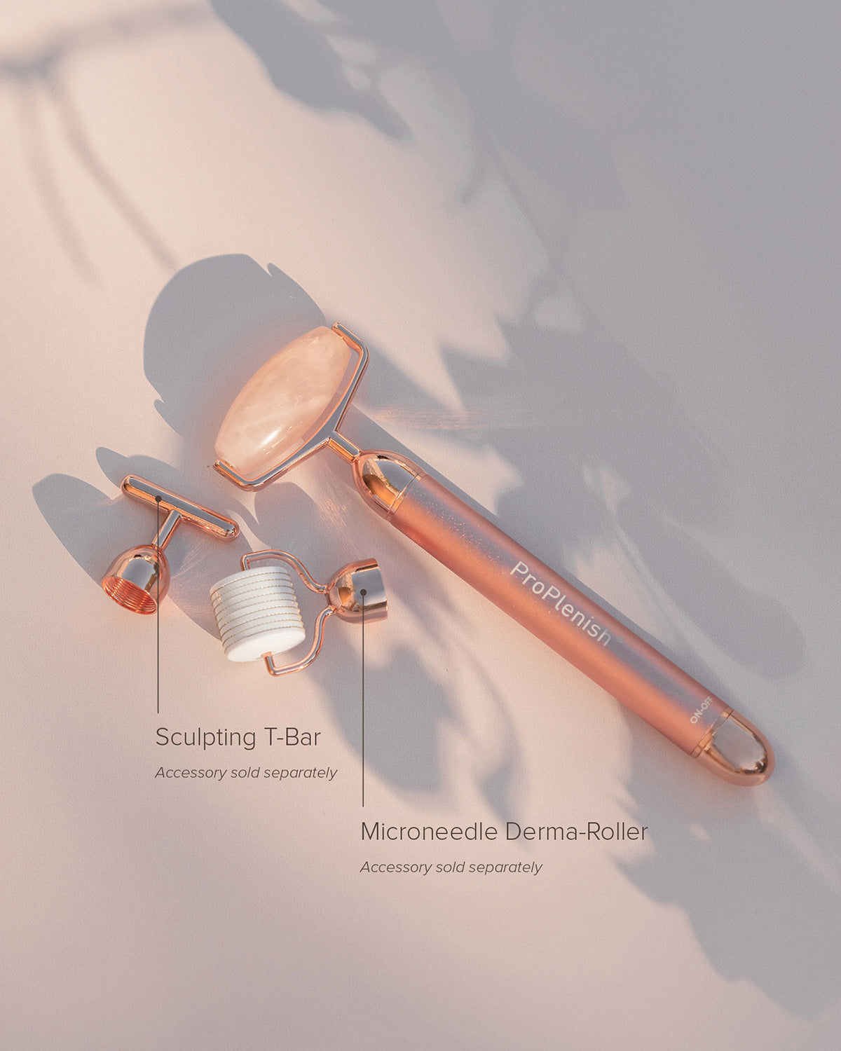 ProPlenish microneedle derma-roller with sculpting T-bar accessory on a soft background